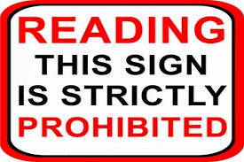 reading this sign is strictly prohibited